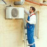 hvac-technician-working-capacitor-part-condensing-unit-1-683x1024
